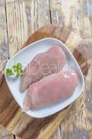 Chicken Breast on wooden Board