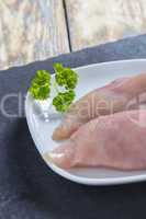chicken breast fillet on slate
