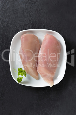 chicken breast fillet on slate