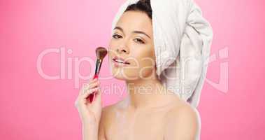 Attractive Fresh Woman Applying Face Makeup