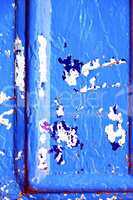nail  paint in the blue  door and rusty