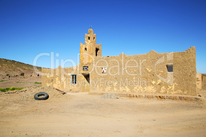 old brown construction in africa morocco and sky  near