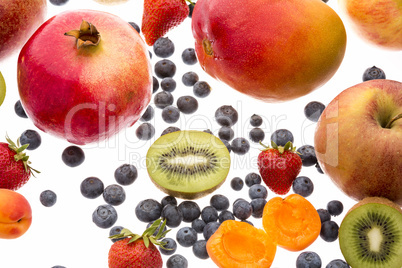 Close-up Of Berries And Other Fruit On White