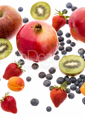 Variety Of Fruit Spread Out On White Background