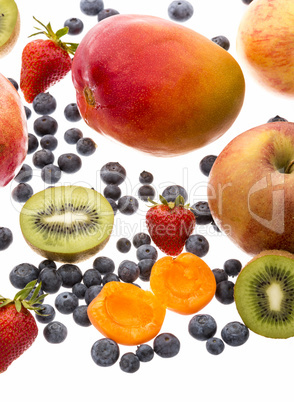 Vertical Closeup Of Assorted Fruits On White