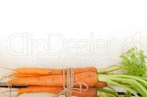 baby carrots bunch tied with rope