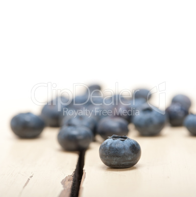 fresh blueberry on white wood table