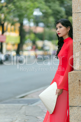 Gorgeous girl in traditional Vietnamese clothing