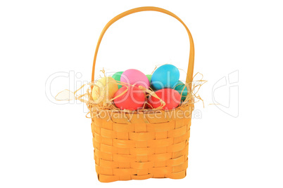 Easter dyed eggs in wooden square shaped basket