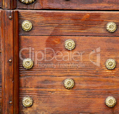 abstract  rusty brass brown knocker door crenna gallarate  italy