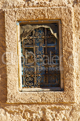 window in morocco africa and old construction wal  historical