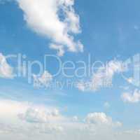 white clouds on a blue sky background