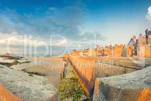 Saint Malo beach and city medieval architecture during Low Tide.