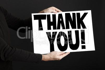 Man holding poster with thank you