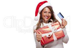 Smiling woman purchasing Christmas gifts