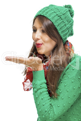 Romantic young woman blowing a kiss
