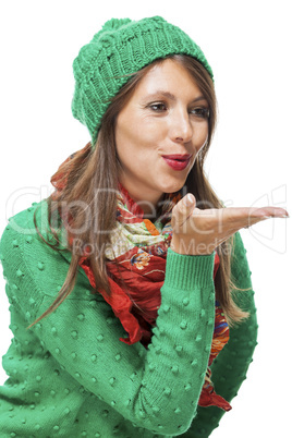 Romantic young woman blowing a kiss