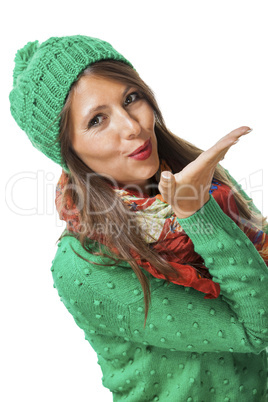 Romantic young woman blowing a kiss