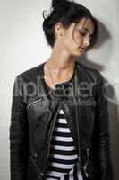 Woman in Black Leather Jacket Holding her Hair