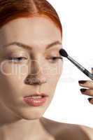 Pretty Woman Applying Eye Shadow Makeup