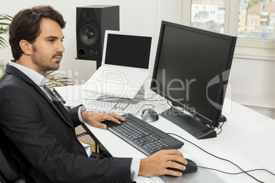 Stylish businessman chatting on the phone Stylish businessman chatting on the phone