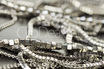 Pile of assorted silver chains