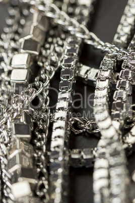 Pile of assorted silver chains