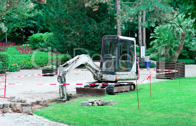 small excavator working in the park