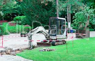 small excavator working in the park