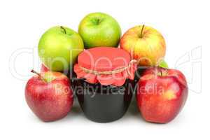 Red apples and pot of jam