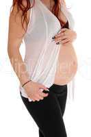 Girl holding her baby belly.