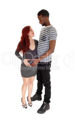 Pregnant woman and husband.