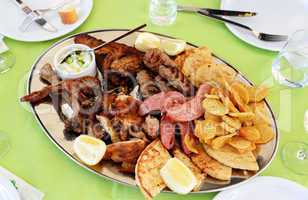 Traditional food in the restaurant on Santorini island, Greece
