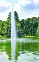 beautiful landscape with a lake with fountains and  park
