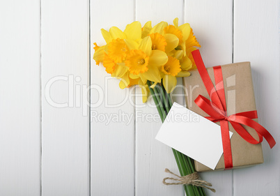 daffodils with a gift box