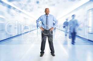 Indian businessman standing at corridor