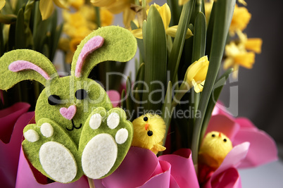 Easter bunny and yellow daffodils.