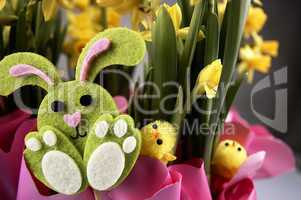 Easter bunny and yellow daffodils.