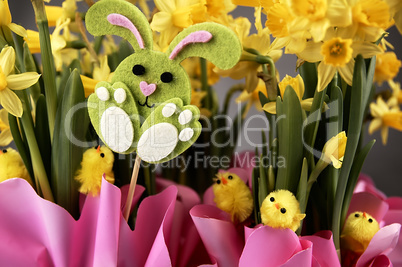 Easter bunny and yellow daffodils.