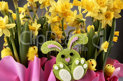 Easter bunny and yellow daffodils.