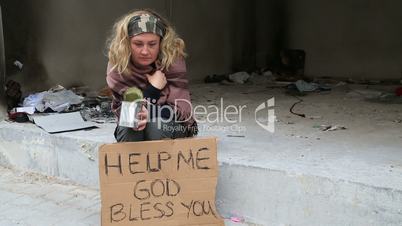 Homeless woman begging