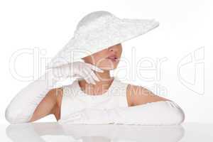Mysterious Woman in Elegant white Hat and glowes