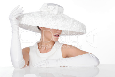 Mysterious Woman in Elegant white Hat and glowes