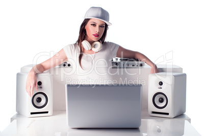 Female DJ with Music Player, Speakers and Laptop