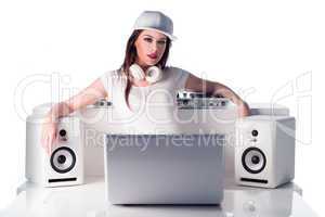 Female DJ with Music Player, Speakers and Laptop