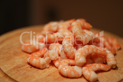 Cooked Shrimp on Top of Wooden Cutting Board