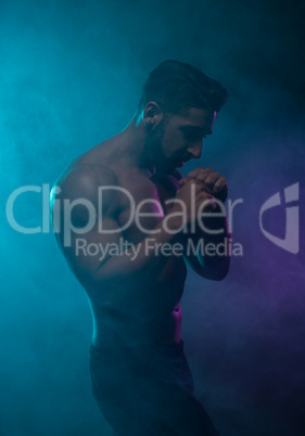 Silhouette Topless Athletic Man in a Fighting Pose
