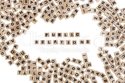 public relations written in small wooden cubes