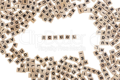 school written in small wooden cubes