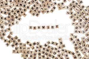 service written in small wooden cubes